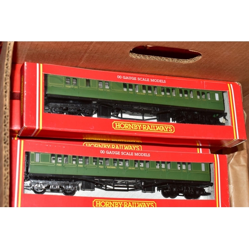 214 - A QUANTITY OF MAINLY BOXED OO GAUGE MODEL RAILWAY ROLLING STOCK, to include boxed Tri-ang Wrenn and ... 