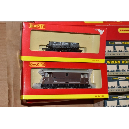 214 - A QUANTITY OF MAINLY BOXED OO GAUGE MODEL RAILWAY ROLLING STOCK, to include boxed Tri-ang Wrenn and ... 