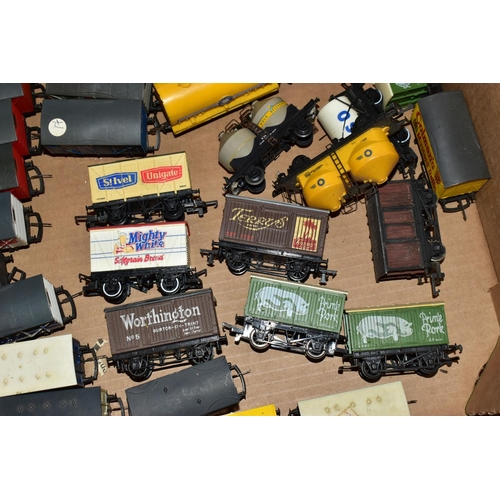 216 - A QUANTITY OF UNBOXED AND ASSORTED OO & HO GAUGE ROLLING STOCK, assorted items to include, Hornby Du... 