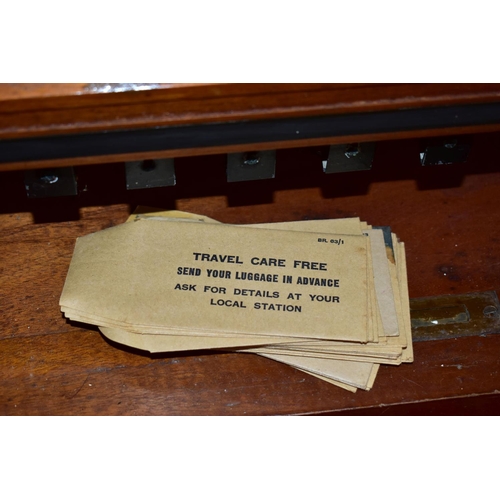 227 - A WOODEN BRITISH RAILWAYS TICKET CABINET,  lockable cabinet with roller shutter front which opens to... 