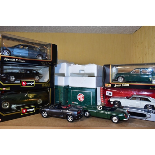 236 - SEVEN BOXED ASSORTED MODERN DIECAST BRITISH CAR MODELS, all 1:18 scale Bburago 1937 Jaguar SS100, 19... 