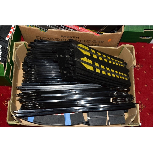 439 - A LARGE COLLECTION OF SCALEXTRIC ACCESSORIES AND TRACK, to include Pits and other trackside building... 