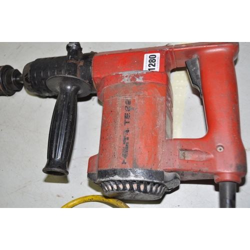 1280 - A COLLECTION OF 110V POWER TOOLS comprising of a Hilti TE22 SDS drill, a Black and Decker Circular S... 