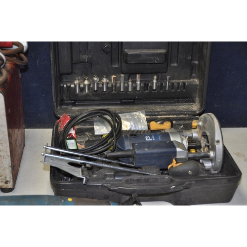 1281 - A PERFORMANCE PRO 1/2in ROUTER in case with bits, a Workzone angle grinder, a Trojan vintage arc wel... 