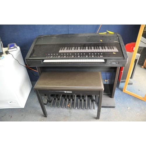 1312 - A YAMAHA ELECTONE EL-700 ORGAN with two keyboards, bass pedals, sustain and swell pedals along with ... 