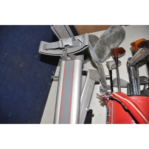 1329 - A GOLF BAG CONTAINING VINTAGE CLUBS by makers such as Howson, Daiwa, MacGregor etc and a Titleist go... 