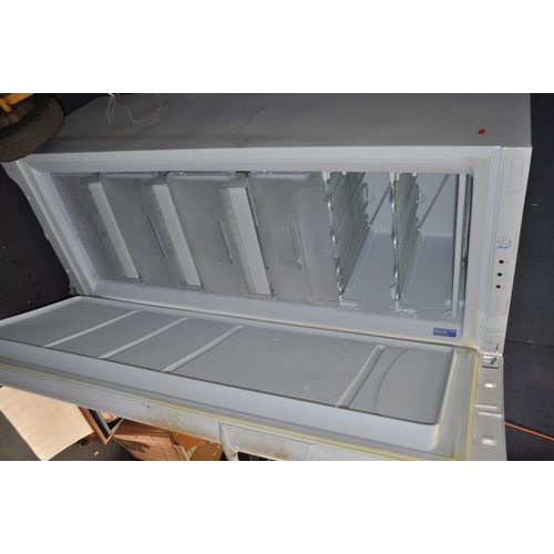 1357 - AN INDESIT LARDER FREEZER width 60cm, depth 60cm and height 150cm (PAT pass and working at -19 degre... 