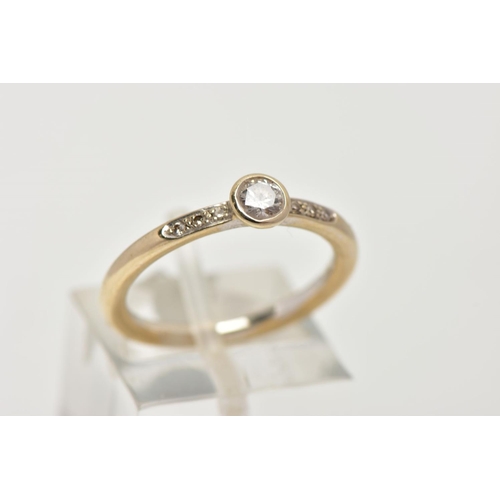 101 - AN 18CT WHITE GOLD DIAMOND RING, centring on a round brilliant cut diamond in a bezel setting, stamp... 