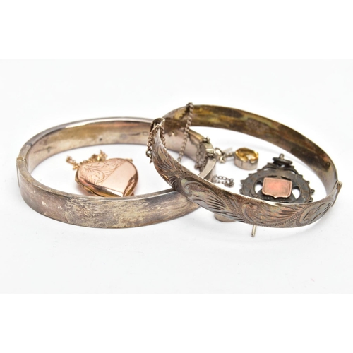 108 - TWO SILVER HINGED BANGLES AND OTHER ITEMS, the first bangle designed with an engraved scrolling foli... 