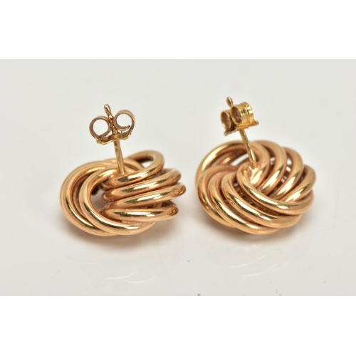 11 - A PAIR OF 9CT GOLD KNOT EARRINGS, a large pair of yellow gold knot earrings, approximate width 17mm,... 