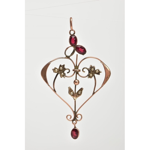 110 - AN AF EDWARDIAN GARNET AND SEED PEARL PENDANT, of an openwork heart design, set with oval cut garnet... 