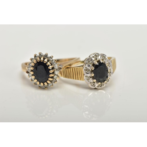 114 - TWO 9CT GOLD CLUSTER RINGS, the first designed with a central claw set, oval cut deep blue sapphire ... 