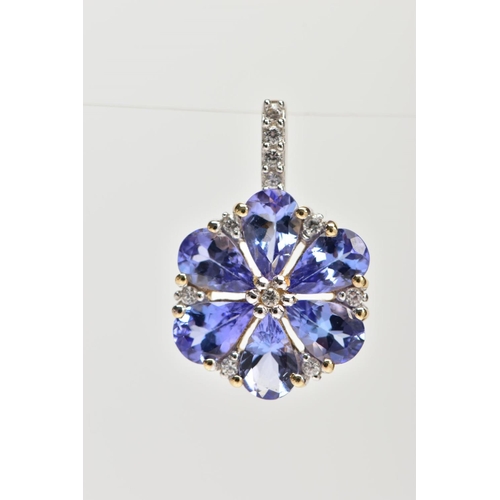 115 - A YELLOW METAL TANZANITE AND SPINEL FLOWER PENDANT, set with six pear cut tanzanite's with colourles... 