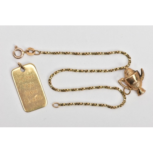 12 - A 9CT GOLD CHARM AND CHAIN, AND A YELLOW METAL PENDANT, a 9ct gold coffee pot charm, hallmarked 9ct ... 