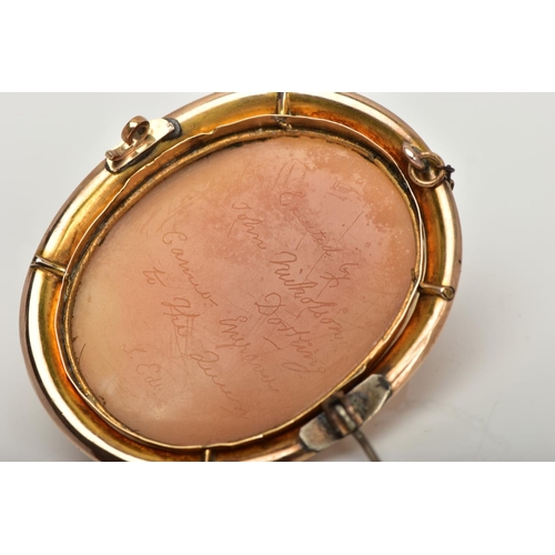 120 - A VICTORIAN CAMEO BROOCH, oval cameo depicting a gentleman in profile, the back has a personal engra... 