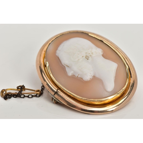 120 - A VICTORIAN CAMEO BROOCH, oval cameo depicting a gentleman in profile, the back has a personal engra... 