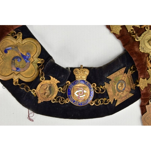 136 - TWO MASONIC COLLARS, the first a blue suede collar set with various metal enamelled medals, inside c... 