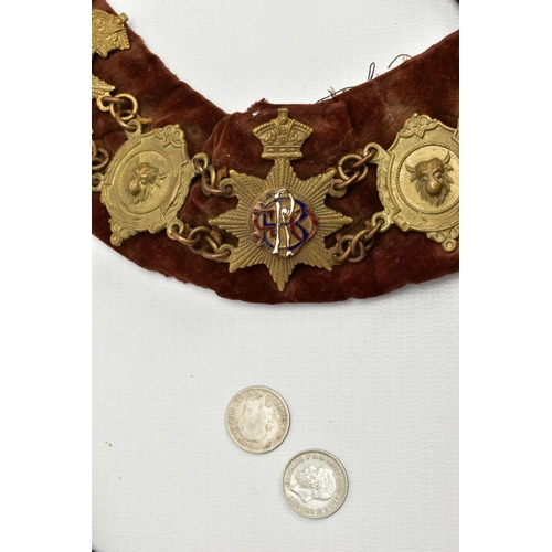 136 - TWO MASONIC COLLARS, the first a blue suede collar set with various metal enamelled medals, inside c... 