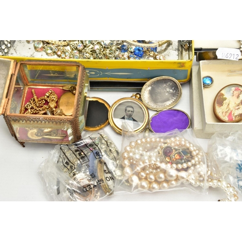 149 - A BOX OF ASSORTED COSTUME JEWELLERY, to include a small glass jewellery box a white metal oval locke... 