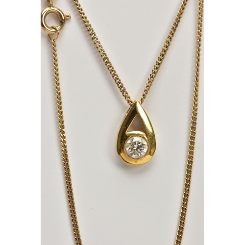 15 - A 9CT GOLD DIAMOND NECKLACE, a pear shaped yellow gold pendant set with a round brilliant cut diamon... 