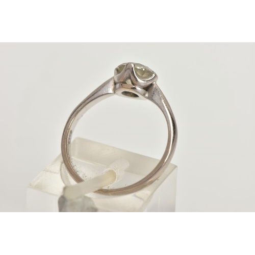 16 - AN 18CT GOLD DIAMOND SOLITAIRE RING, a round brilliant cut diamond in a four prong white gold settin... 