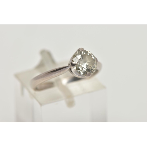 16 - AN 18CT GOLD DIAMOND SOLITAIRE RING, a round brilliant cut diamond in a four prong white gold settin... 