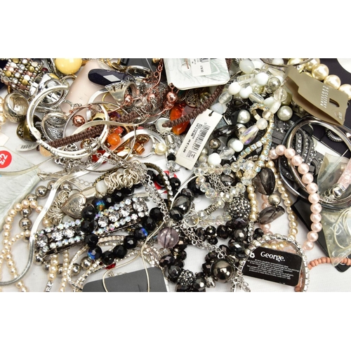 163 - A BOX OF ASSORTED COSTUME JEWELLERY, to include three signed Marcel Wanders rings, with other assort... 