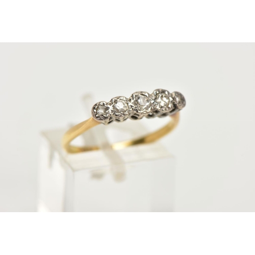 18 - A YELLOW METAL FIVE STONE DIAMOND RING, five old cut diamonds in a white metal illusion setting, app... 