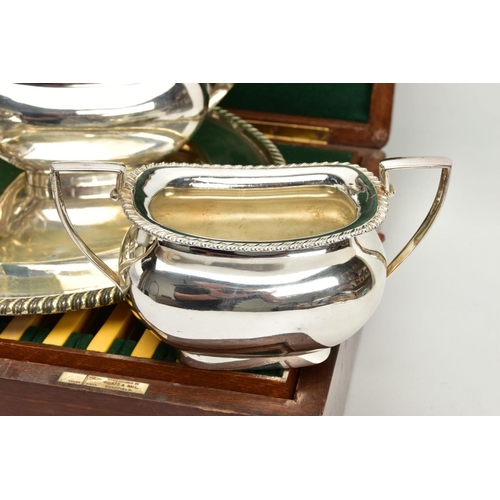 193 - A CANTEEN OF CUTLERY AND A TEA SERVICE SET, a complete 'Walker & Hall' canteen of cutlery, a four pi... 