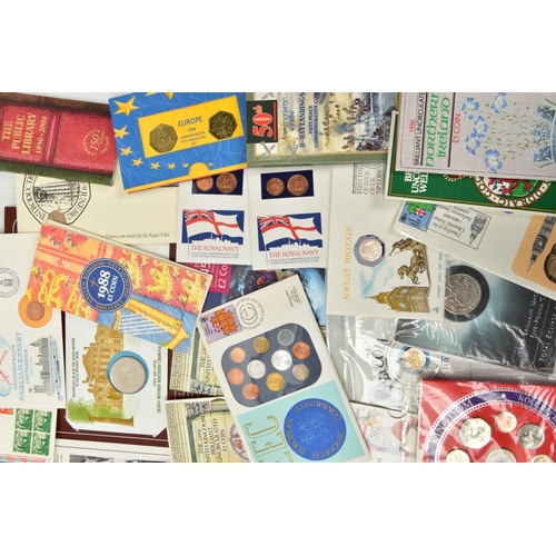 209 - A CARDBOARD BOX CONTAINING COIN AND STAMP PACKS, ROYAL MINT COIN AND YEAR PACKS, to include BU sets ... 