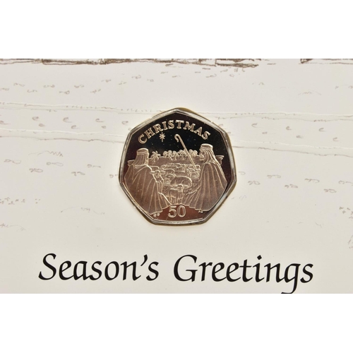 224 - FIVE GIBRALTAR CHRISTMAS GREETING CARDS, to include their relevant fifty pence diamond finish coins,... 