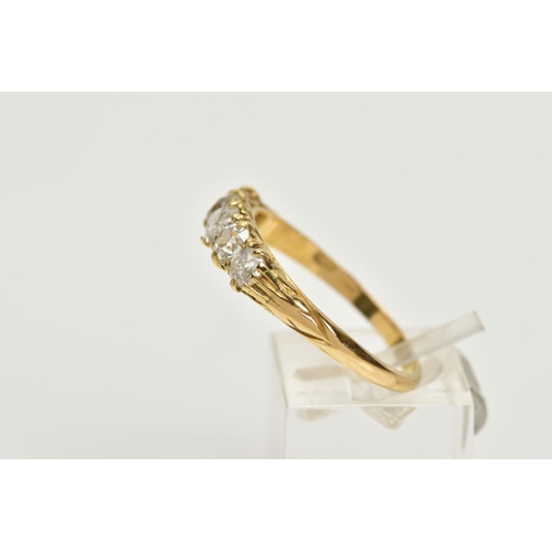 231 - A YELLOW METAL FIVE STONE DIAMOND RING, designed with a row of five old cut diamonds, estimated tota... 