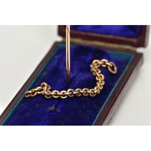 232 - A YELLOW METAL STICK PIN AND PART CHAIN, a plain polished oval set with a cultured star set pearl, u... 