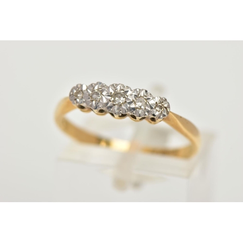 32 - A YELLOW METAL DIAMOND RING, designed with a row of five illusion set single cut diamonds, pinched s... 