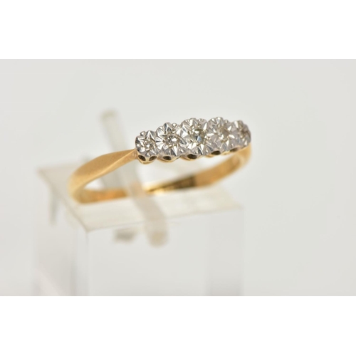 32 - A YELLOW METAL DIAMOND RING, designed with a row of five illusion set single cut diamonds, pinched s... 