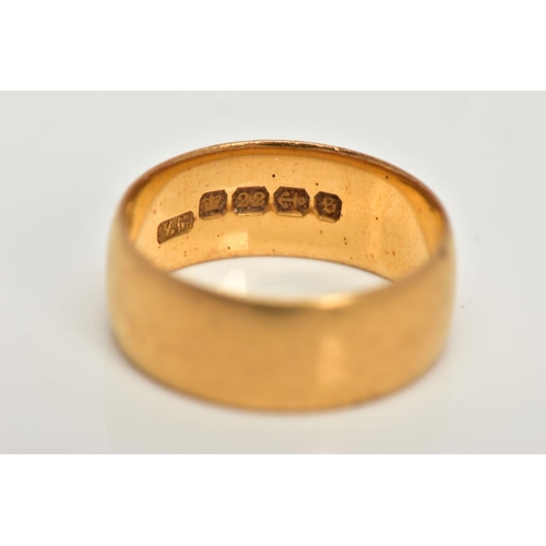 33 - A 22CT GOLD BAND RING, wide plain polished band, approximate width 7.0mm, hallmarked 22ct Birmingham... 