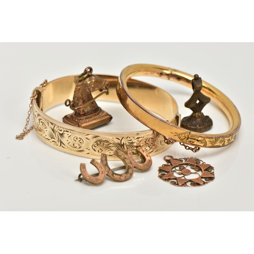 35 - TWO GOLD PLATED HINGED BANGLES, TWO FOB SEALS AND A PENDANT, to include a floral engraved hinged ban... 