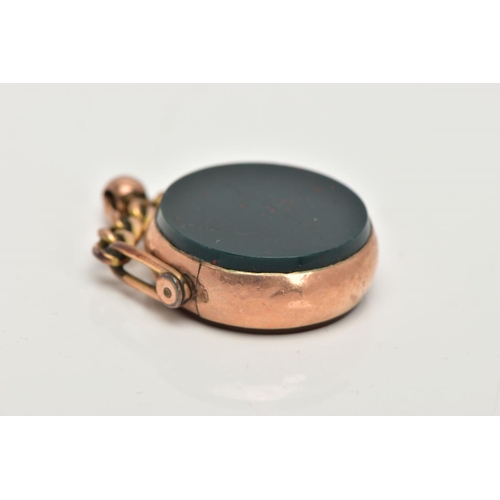 36 - A LATE 19TH CENTURY 9CT GOLD SWIVEL FOB, of a circular form set with bloodstone and carnelian panels... 