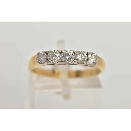 47 - A YELLOW METAL FIVE STONE DIAMOND RING, set with five slightly graduating round brilliant cut diamon... 