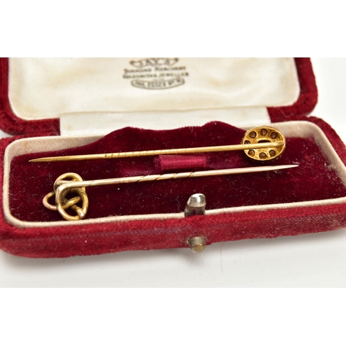 54 - TWO YELLOW METAL STICK PINS, the first detailed with an oval cluster, centring on an oval cut amethy... 