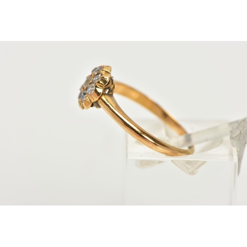 83 - A YELLOW METAL DIAMOND FLOWER RING, flower design set with old cut diamonds, estimated total diamond... 