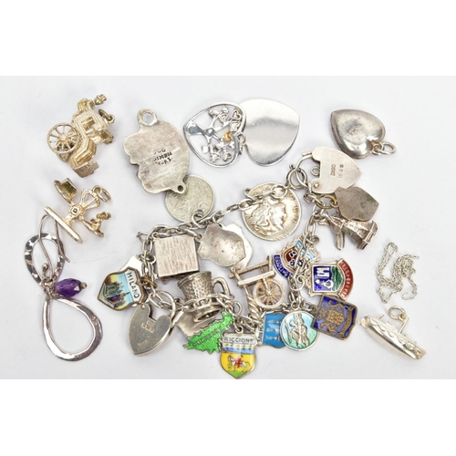 89 - A CHARM BRACELET, LOOSE CHARMS AND PENDANTS, the charm bracelet fitted with various enamel shield ch... 