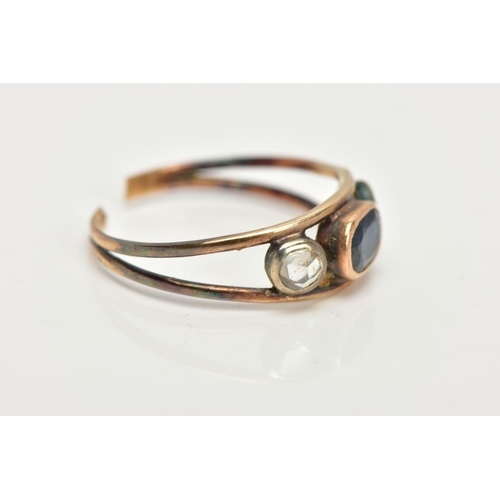 9 - AN AF GEM SET RING, yellow metal ring with a split shank, set with a central oval cut blue sapphire,... 