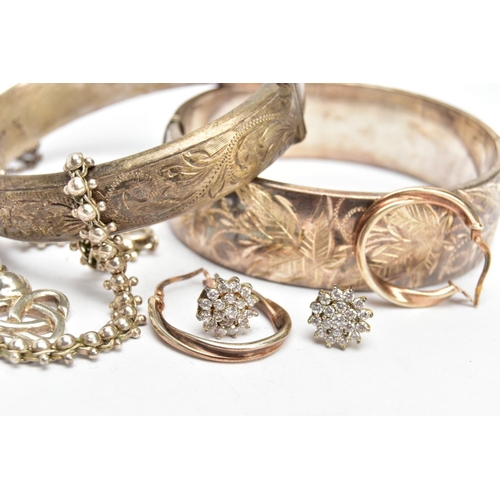 94 - TWO SILVER BANGLES, EARRINGS AND A BRACELET, to include a wide hinged bangle decorated with a floral... 