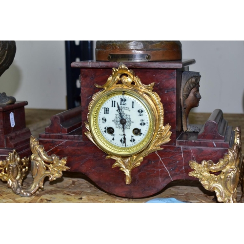 434 - AN EARLY 20TH CENTURY BRONZED SPELTER AND ROUGE MARBLE CLOCK GARNITURE, the clock with figural surmo... 