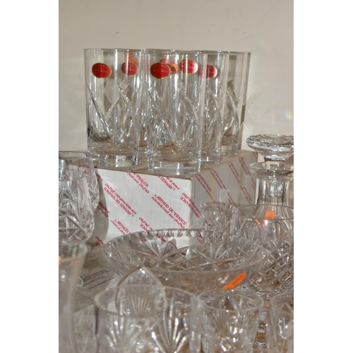 449 - A GROUP OF CUT CRYSTAL AND OTHER GLASSWARES, more than forty pieces to include square and round deca... 