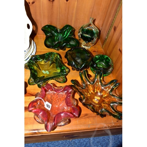 463 - SIX MURANO STYLE COLOURED GLASS BOWLS AND A PRESS MOULDED GREEN GLASS BOWL, including a red, orange ... 