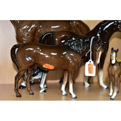 471 - TWO BESWICK BROWN GLOSS HORSES AND A FOAL, TOGETHER WITH ANOTHER UNMARKED BROWN GLOSS HORSE, the Bes... 