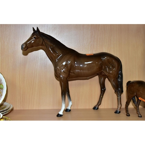 471 - TWO BESWICK BROWN GLOSS HORSES AND A FOAL, TOGETHER WITH ANOTHER UNMARKED BROWN GLOSS HORSE, the Bes... 