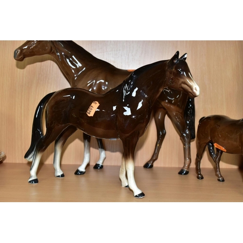 471 - TWO BESWICK BROWN GLOSS HORSES AND A FOAL, TOGETHER WITH ANOTHER UNMARKED BROWN GLOSS HORSE, the Bes... 